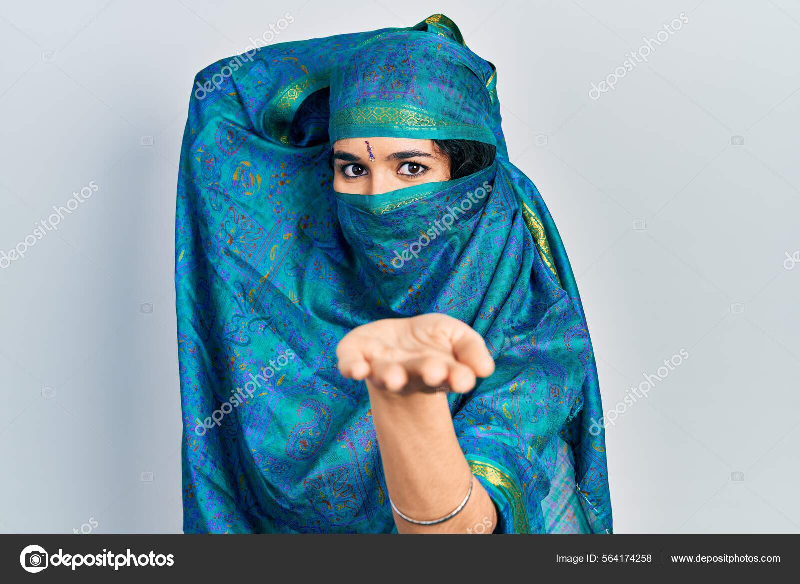 Young Indian Woman Wearing Sari Covering Head Face Doing Elegant