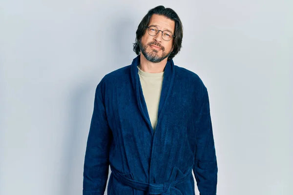 Middle Age Caucasian Man Wearing Bathrobe Glasses Relaxed Serious Expression — Stock Photo, Image