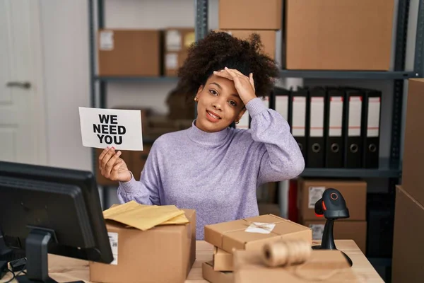 Young African American Woman Working Small Business Ecommerce Holding Banner — стоковое фото