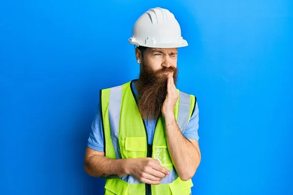 Redhead Man Long Beard Wearing Safety Helmet Reflective Jacket Touching — Zdjęcie stockowe