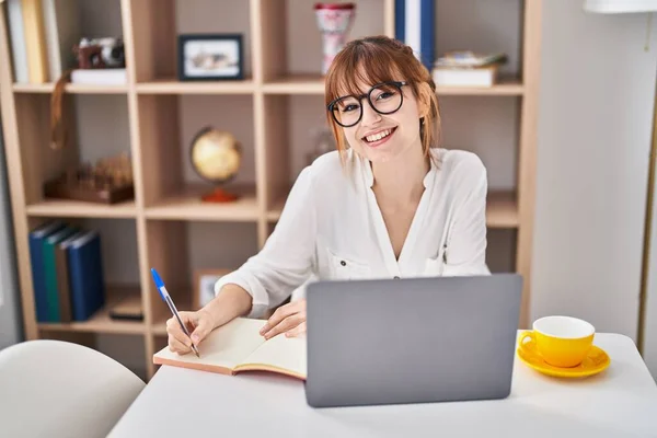 Young Woman Using Laptop Writing Notebook Home — Stock Photo, Image