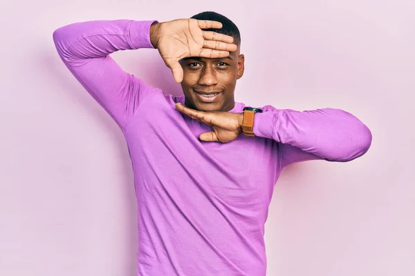 Young Black Man Wearing Casual Pink Sweater Smiling Cheerful Playing — Stock Photo, Image