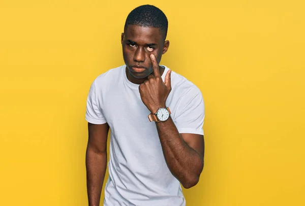Young African American Man Wearing Casual White Shirt Pointing Eye — Stock Fotó