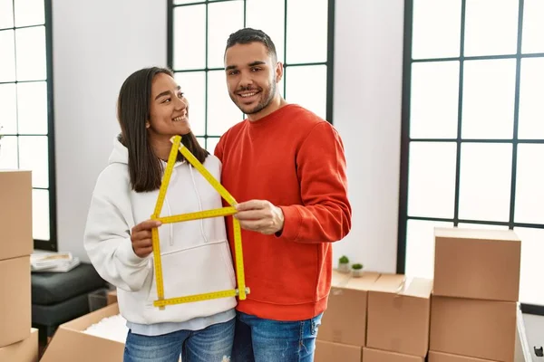 Young Latin Couple Smiling Happy Holding House Project New Home — Stock Photo, Image