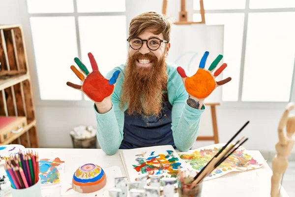 Young Redhead Man Smiling Confident Showing Painted Palm Hands Art — Stok fotoğraf