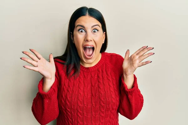 Beautiful Brunette Woman Wearing Wool Winter Sweater Celebrating Crazy Amazed — Stock Photo, Image