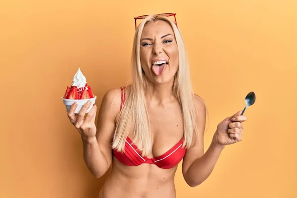 Young Blonde Woman Wearing Bikini Holding Ice Cream Sticking Tongue — Stock Photo, Image