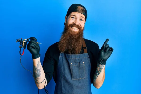 Redhead Man Long Beard Tattoo Artist Wearing Professional Uniform Gloves — ストック写真