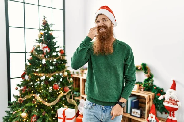 Redhead Man Long Beard Wearing Christmas Hat Christmas Tree Pointing — Photo