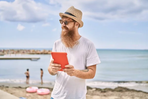 Young Redhead Tourist Man Smiling Happy Using Touchpad Beach — Photo