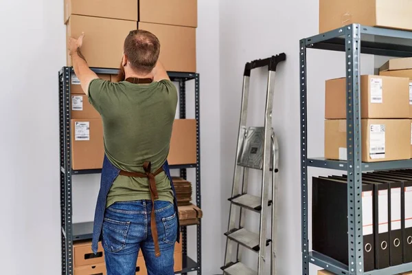 Young Redhead Man Business Worker Back View Organizing Packages Office — Stockfoto