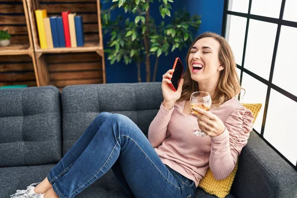 Young Woman Talking Smartphone Drinking Wine Home — Zdjęcie stockowe