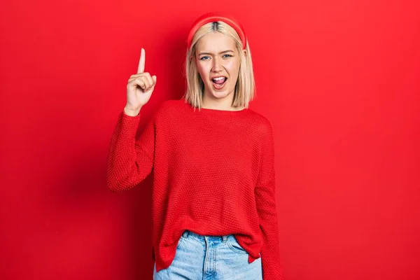 Beautiful Blonde Woman Wearing Casual Red Sweater Pointing Finger Successful — Φωτογραφία Αρχείου