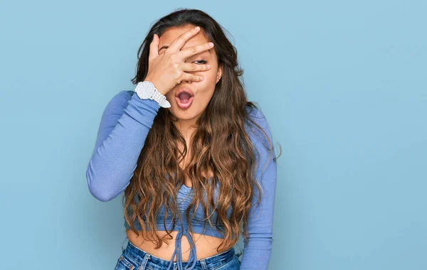 Young Hispanic Girl Wearing Casual Clothes Peeking Shock Covering Face — Stock Photo, Image