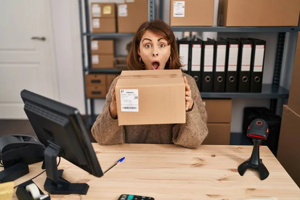 Young Beautiful Woman Working Small Business Ecommerce Holding Box Afraid — Stockfoto