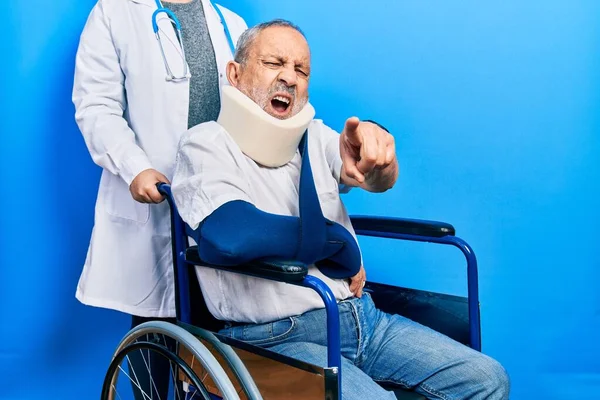 Handsome Senior Man Beard Sitting Wheelchair Neck Collar Pointing Displeased — Foto Stock