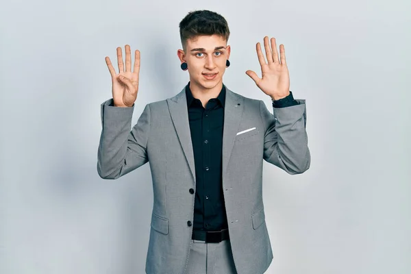 Young Caucasian Boy Ears Dilation Wearing Business Jacket Showing Pointing — ストック写真