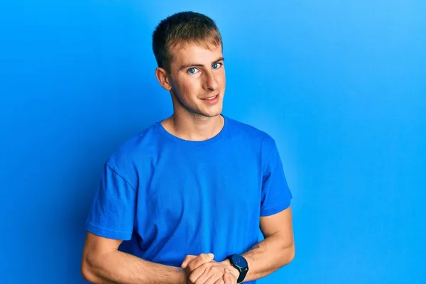Young Caucasian Man Wearing Casual Blue Shirt Hands Together Crossed — Stockfoto
