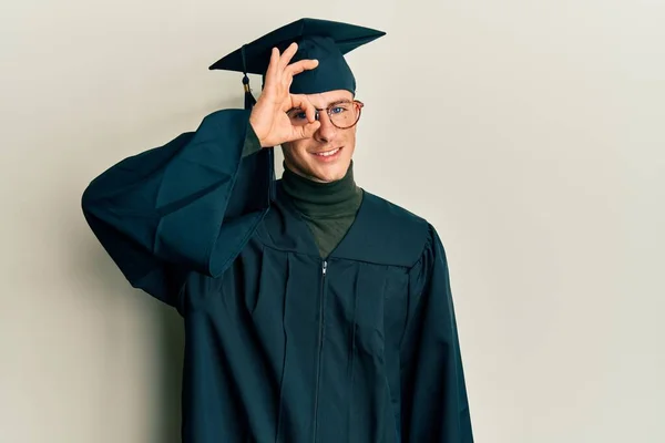 Young Caucasian Man Wearing Graduation Cap Ceremony Robe Doing Gesture — Stok fotoğraf