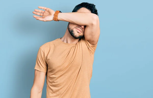 Hispanic Man Beard Wearing Casual Shirt Covering Eyes Arm Looking — Stock Photo, Image
