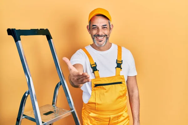 Handsome Middle Age Man Grey Hair Holding Ladder Smiling Friendly — 스톡 사진