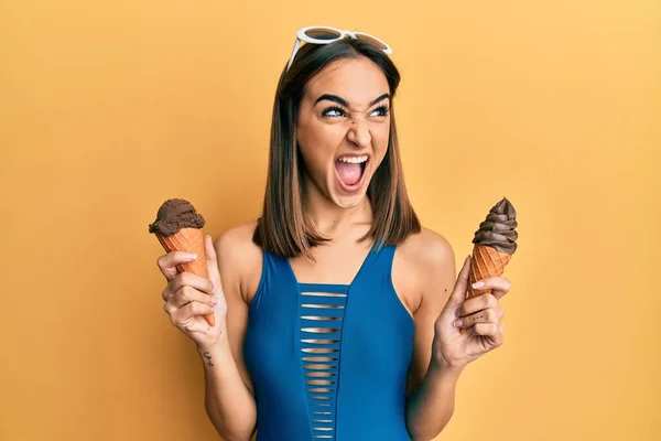 Young Brunette Girl Wearing Swimwear Holding Two Ice Cream Cones — 스톡 사진