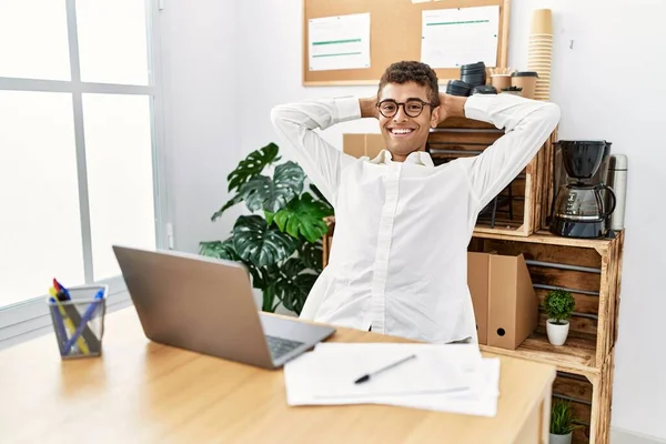 Young Hispanic Man Relaxing Working Laptop Business Office — Fotografia de Stock