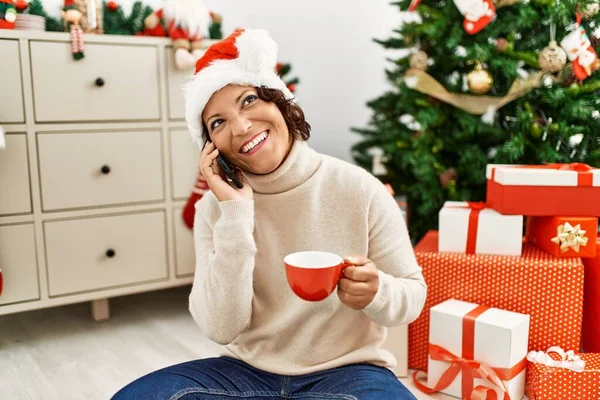 Middle Age Hispanic Woman Talking Smartphone Drinking Coffee Sitting Christmas — Stock Photo, Image