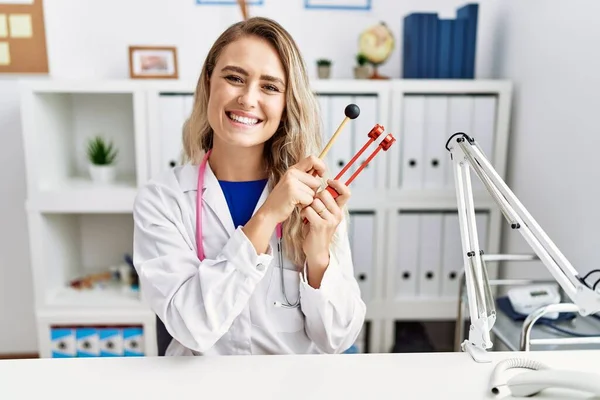 Young Beautiful Doctor Woman Holding Diapason Instrument Smiling Happy Cool — Photo