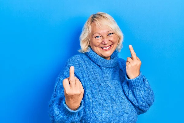 Middle Age Blonde Woman Wearing Casual Clothes Showing Middle Finger — 스톡 사진
