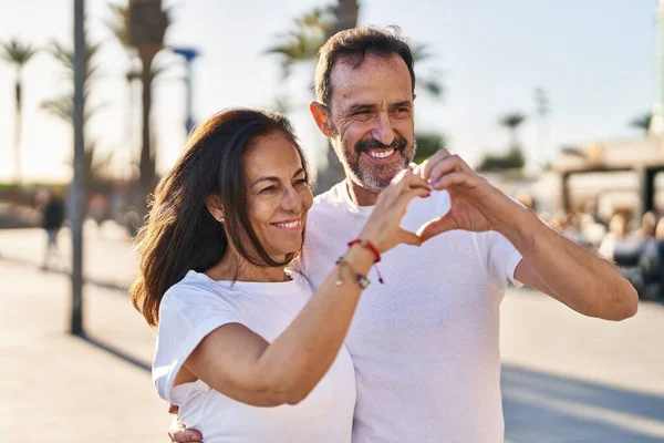 Middle Age Man Woman Couple Doing Heart Symbol Arms Street — стоковое фото