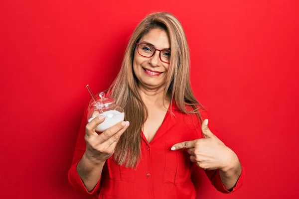 Middle Age Hispanic Woman Holding Bowl Sugar Pointing Finger One — Stock Photo, Image