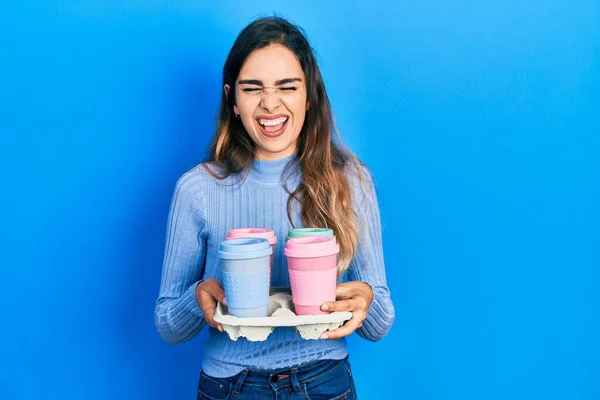 Young Hispanic Girl Holding Tray Take Away Coffee Smiling Laughing — Fotografia de Stock