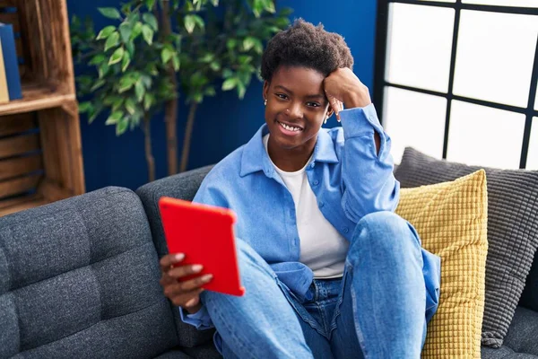 African American Woman Using Touchpad Sitting Sofa Home — Stockfoto