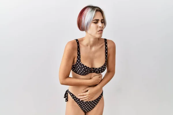 Young Beautiful Woman Wearing Swimsuit Isolated Background Hand Stomach Because — Stockfoto