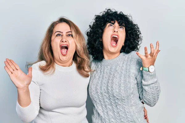 Middle East Mother Daughter Wearing Casual Clothes Crazy Mad Shouting — Stock Photo, Image