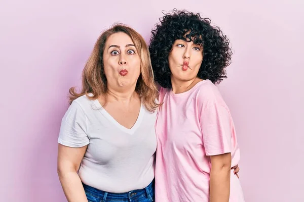 Middle East Mother Daughter Wearing Casual Clothes Making Fish Face — Stock Photo, Image