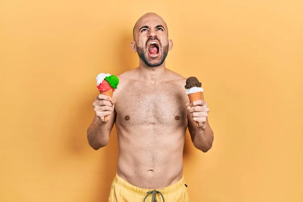 Young Bald Man Wearing Swimwear Holding Two Ice Cream Cones — Stock Photo, Image