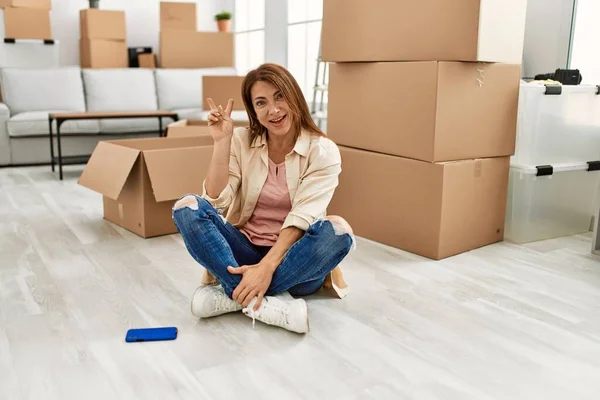 Senior Middle East Woman Sitting Floor New Home Smiling Happy — Stock Photo, Image