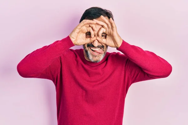 Middle Age Hispanic Man Wearing Casual Clothes Doing Gesture Binoculars — Stock Photo, Image