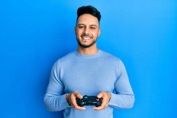 Young Arab Man Playing Video Game Holding Controller Smiling Happy —  Fotos de Stock