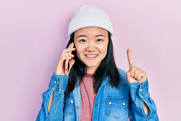 Young Chinese Girl Having Conversation Talking Smartphone Smiling Idea Question — Stock Fotó