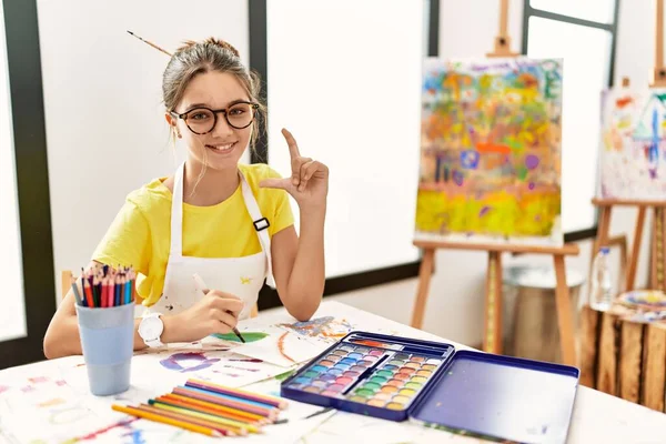 Young Brunette Teenager Art Studio Smiling Confident Gesturing Hand Doing — Stock Photo, Image