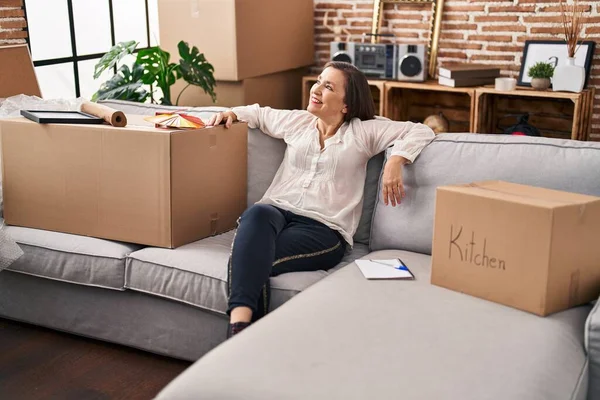 Middle Age Woman Relaxed Hands Head Sitting Sofa New Home — Stock Photo, Image