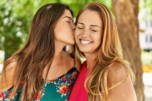 Mother Daughter Kissing Hugging Each Other Standing Park — Stock Photo, Image