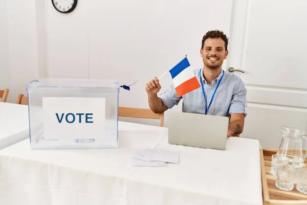 Young Hispanic Man Smiling Confident Holding France Flag Working Electoral — Stock Photo, Image