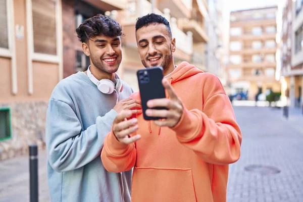 Two Man Couple Hugging Each Other Using Smartphone Street —  Fotos de Stock