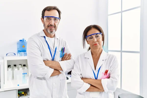 Middle Age Man Woman Partners Wearing Scientist Uniform Standing Arms — Stock Photo, Image