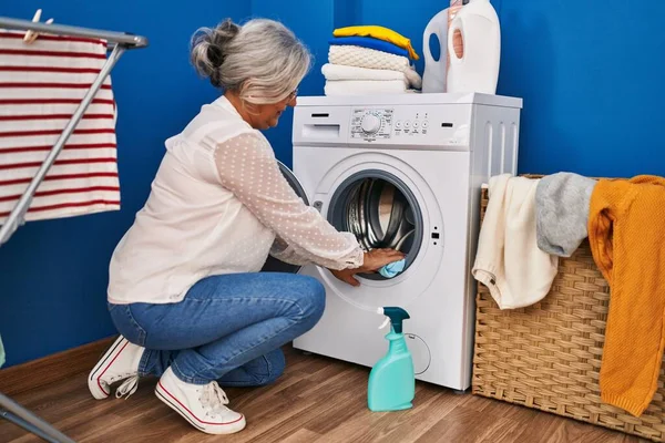 Middle Age Woman Cleaning Washing Machine Laundry Room — Foto de Stock