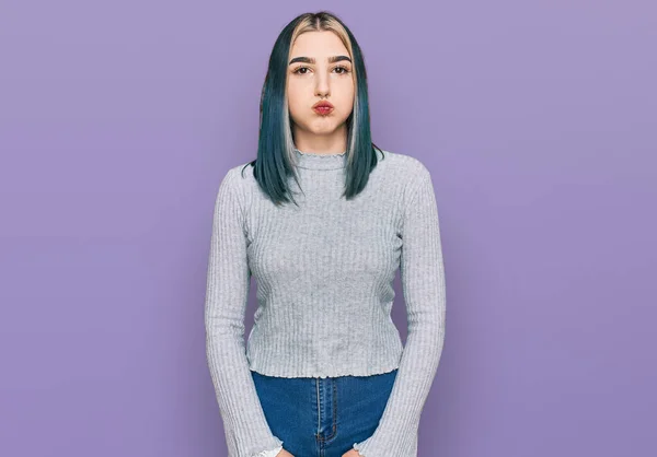 Young Modern Girl Wearing Casual Sweater Puffing Cheeks Funny Face — Stock Photo, Image